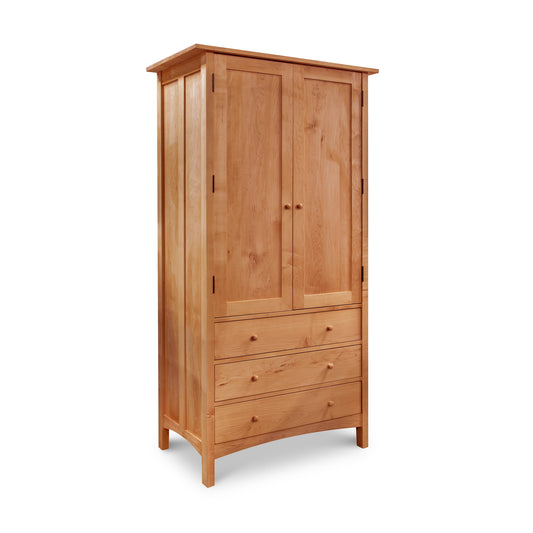 A modern Burlington Shaker Tall Armoire with drawers by Vermont Furniture Designs.