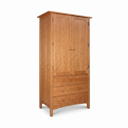 Burlington Shaker Tall Armoire by Vermont Furniture Designs with 2 doors, 3 drawers, and a natural wood finish. American made, high quality craftsmanship.