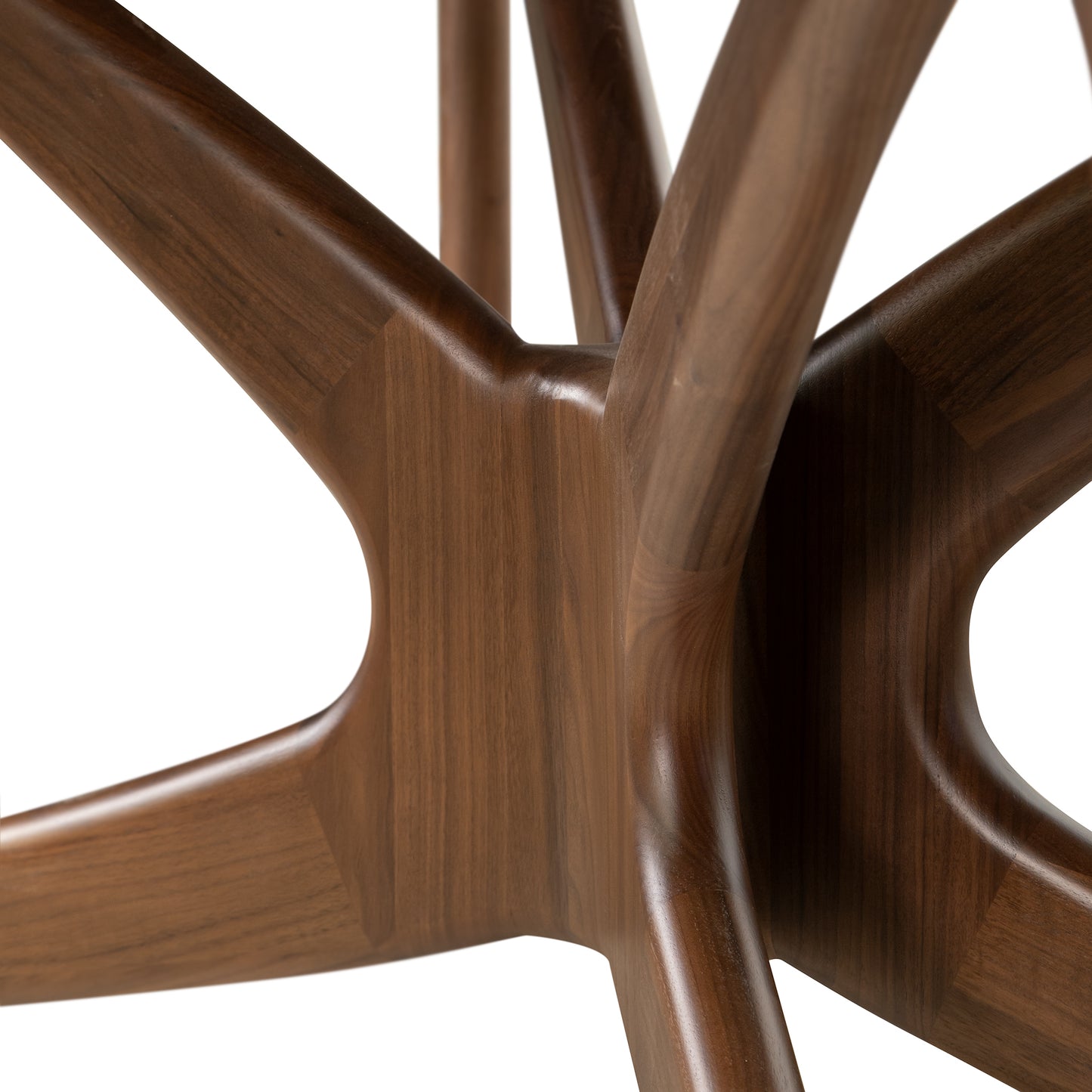 Detail of Copeland Furniture Butterfly Extension Dining Table legs, showcasing smooth, high-quality American hardwood craftsmanship.