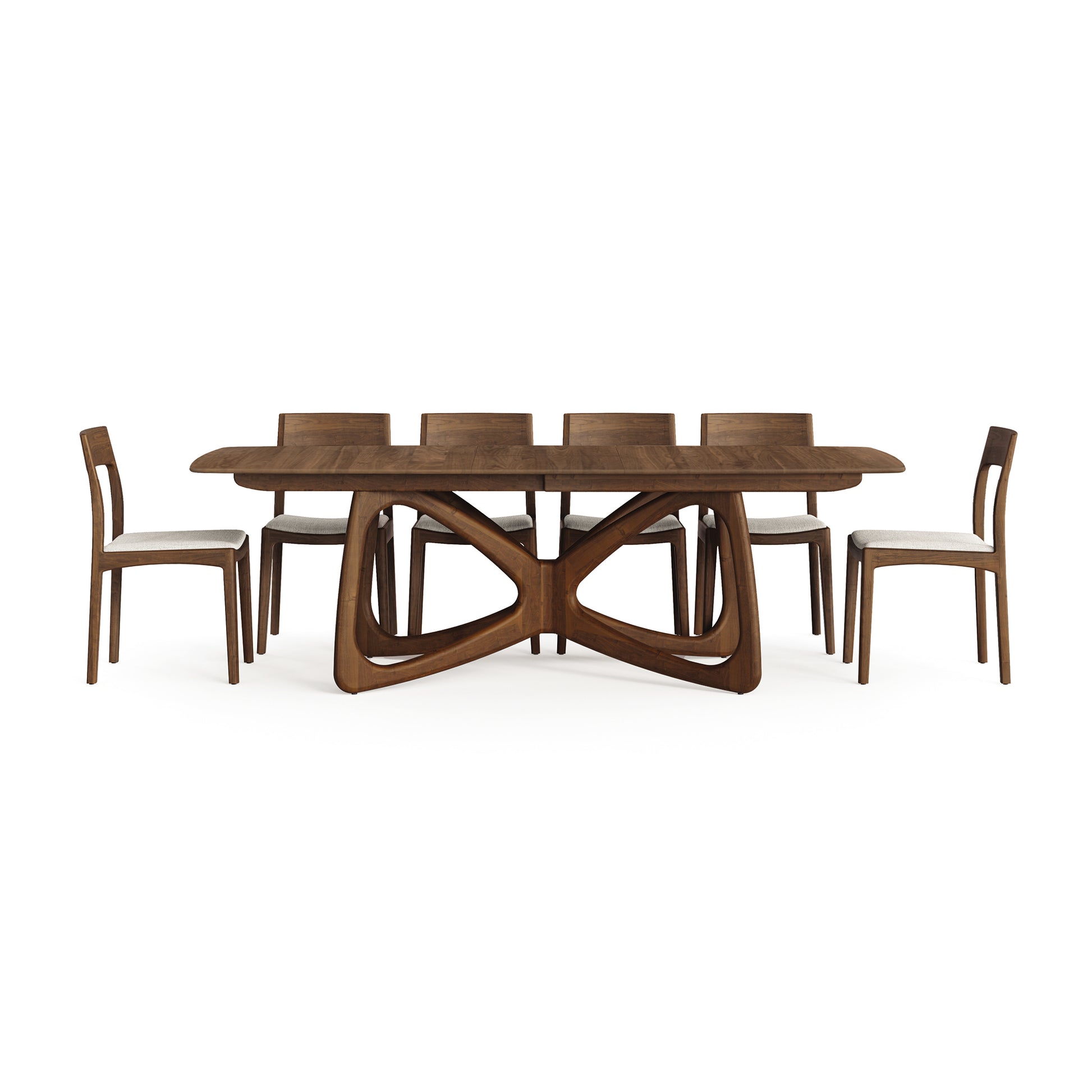 Butterfly Extension Dining Table by Copeland, showcasing a sculptural base in sustainably sourced North American hardwoods.