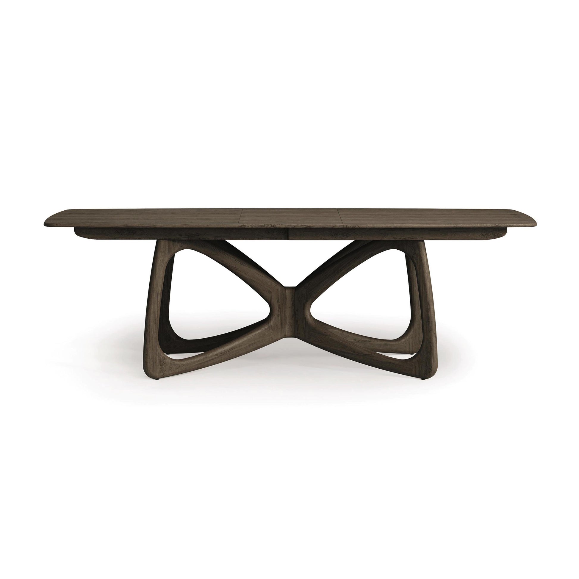 Butterfly Extension Dining Table by Copeland Furniture made from sustainable hardwood featuring a dark geometric base and sleek rectangular top.