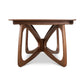 Copeland Butterfly Extension Dining Table features sustainably sourced hardwood and an interlocking base, handcrafted in America.