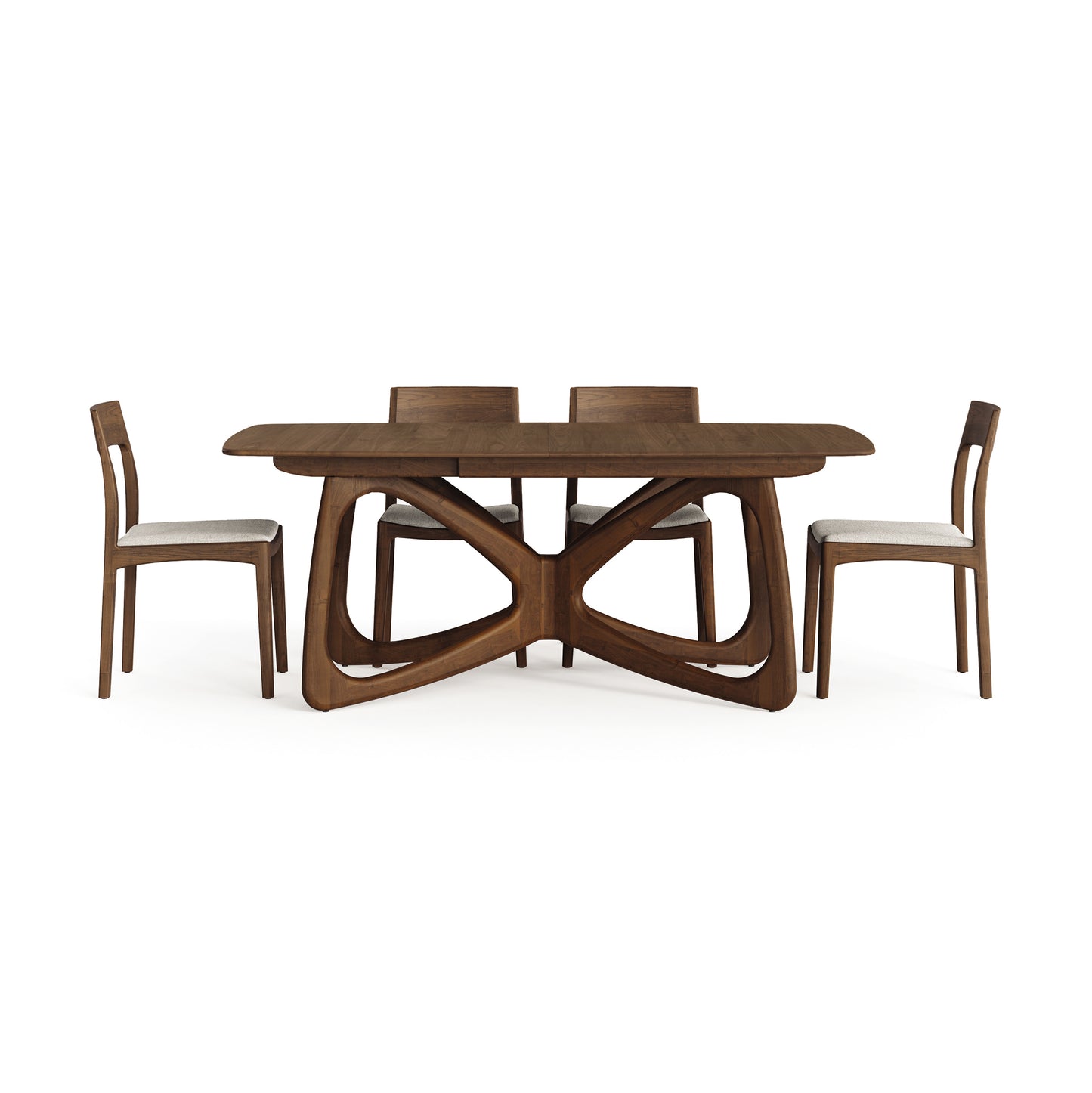 Sustainably sourced hardwood Butterfly Extension Dining Table by Copeland Furniture with a distinctive base and cushioned chairs.