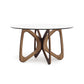 Butterfly Round Glass Top Table with geometric wooden base crafted from sustainably sourced hardwoods by Copeland Furniture.