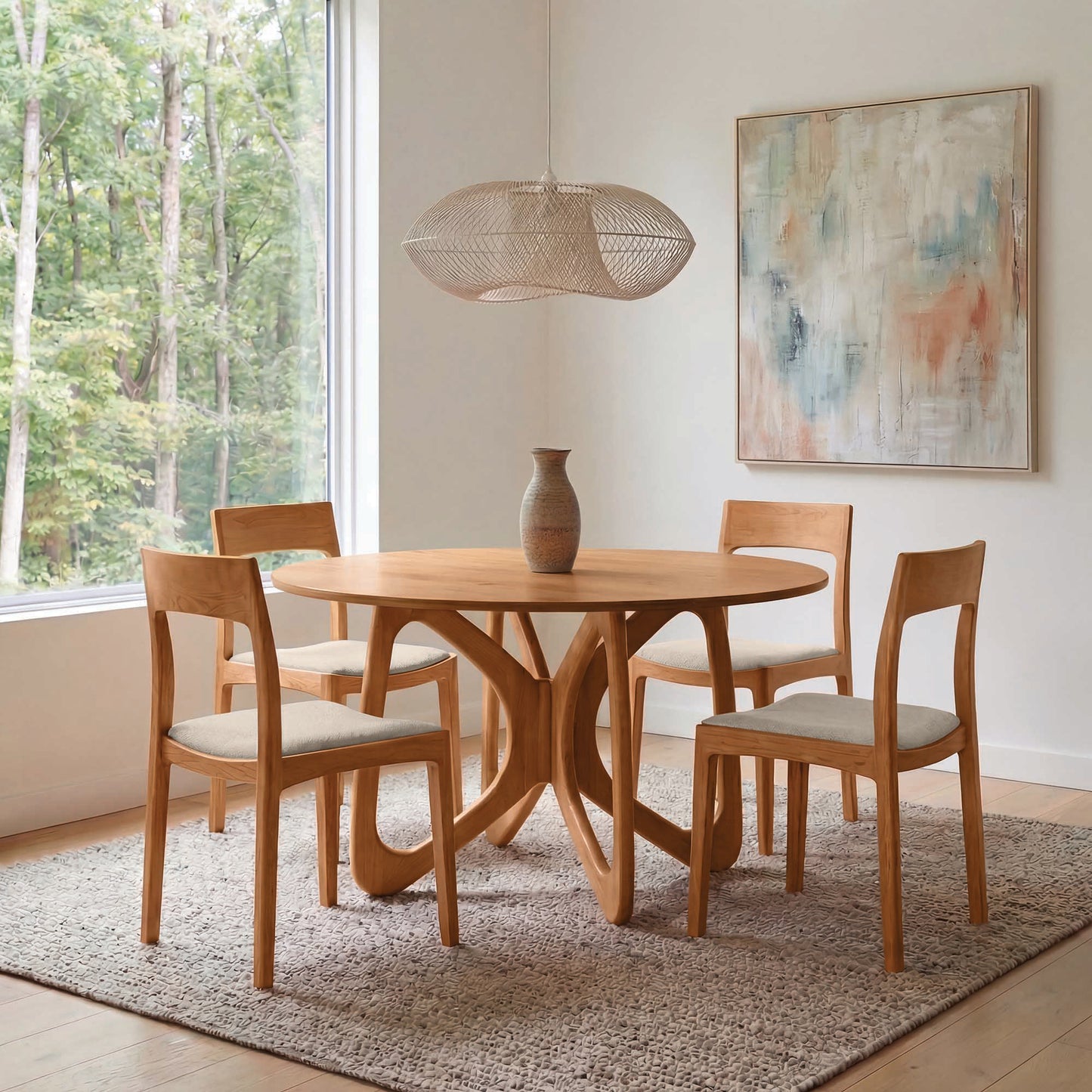Copeland Furniture Butterfly Round Solid Top Dining Table with four matching chairs, crafted in America from premium wood, the centerpiece of the room.