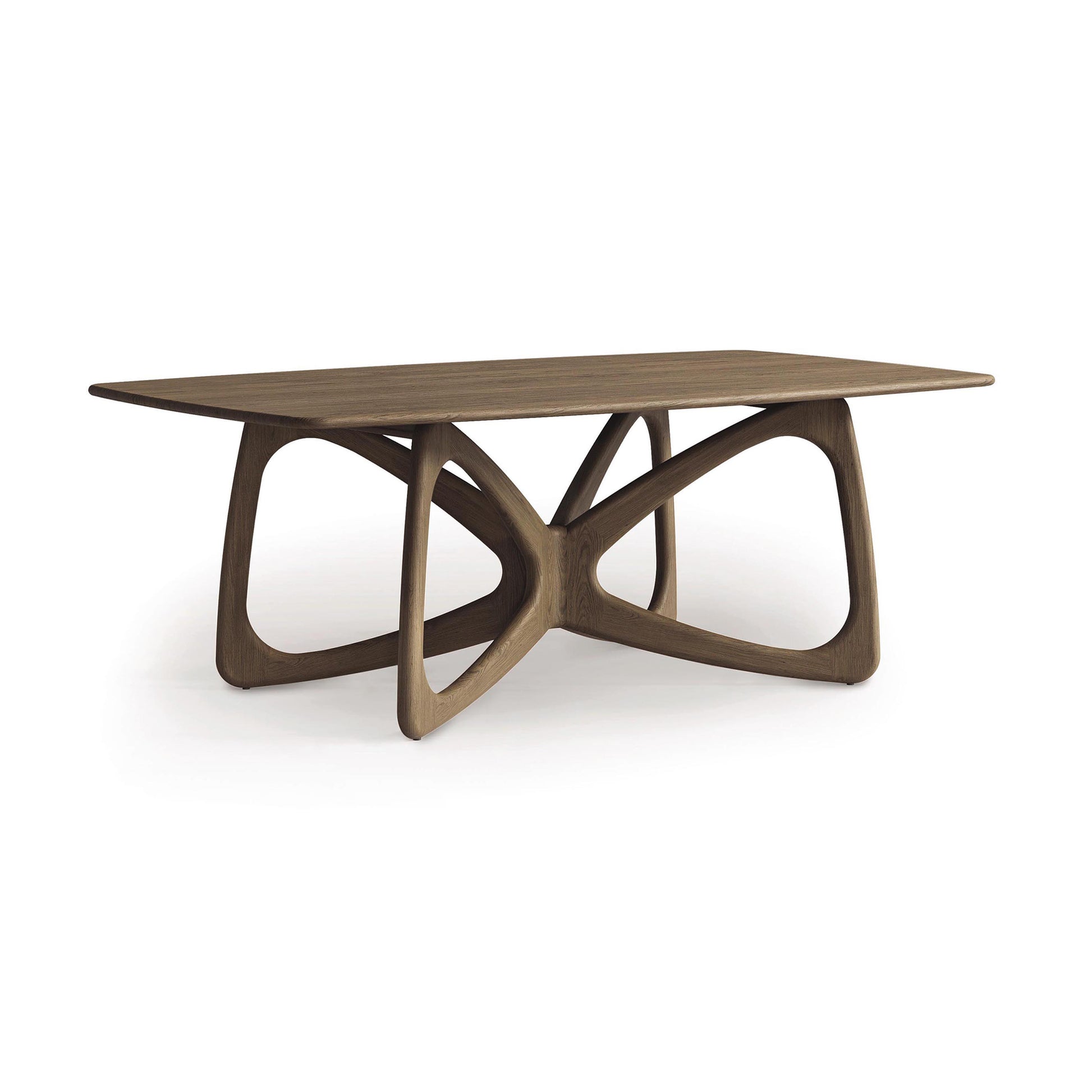 Introducing Copeland Furniture's Butterfly Solid Top Dining Table, a masterpiece of modern aesthetics. Carefully crafted from sustainably sourced hardwoods, it features a rectangular top paired with an artistic, curved base adorned with interlocking geometric shapes that elegantly highlight the natural wood grain.