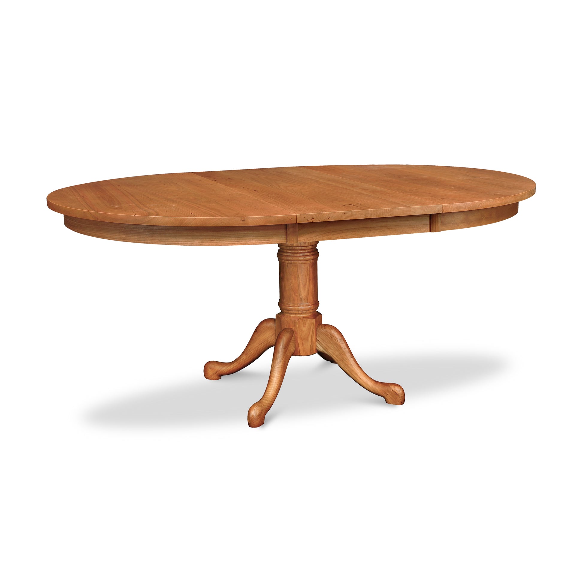 A Cabriole Single Pedestal Round Extension Table with a traditional claw foot base by Lyndon Furniture.