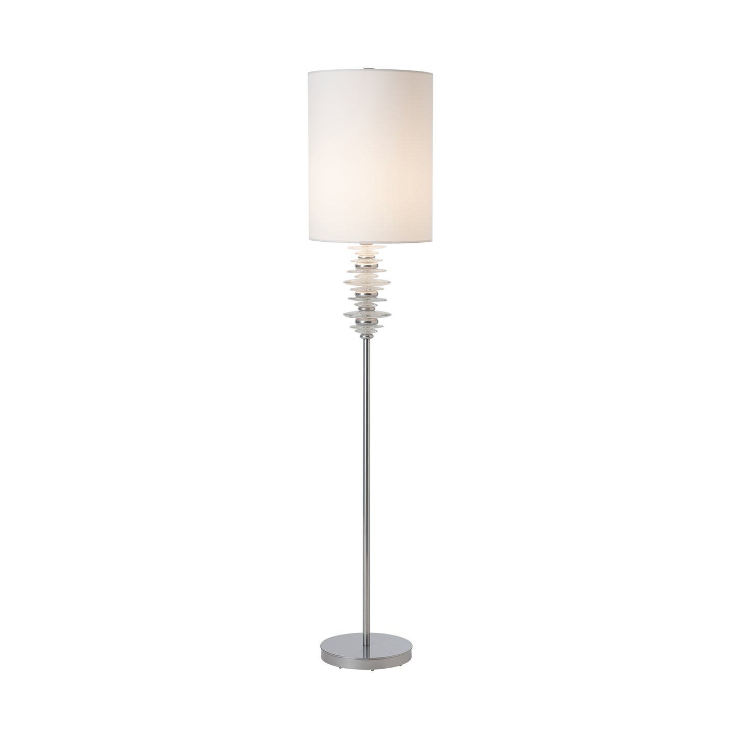 Cairn Floor Lamp by Hubbardton Forge with a white cylindrical shade, sleek metal pole, and hand-crafted stacked glass accents, made in the USA.