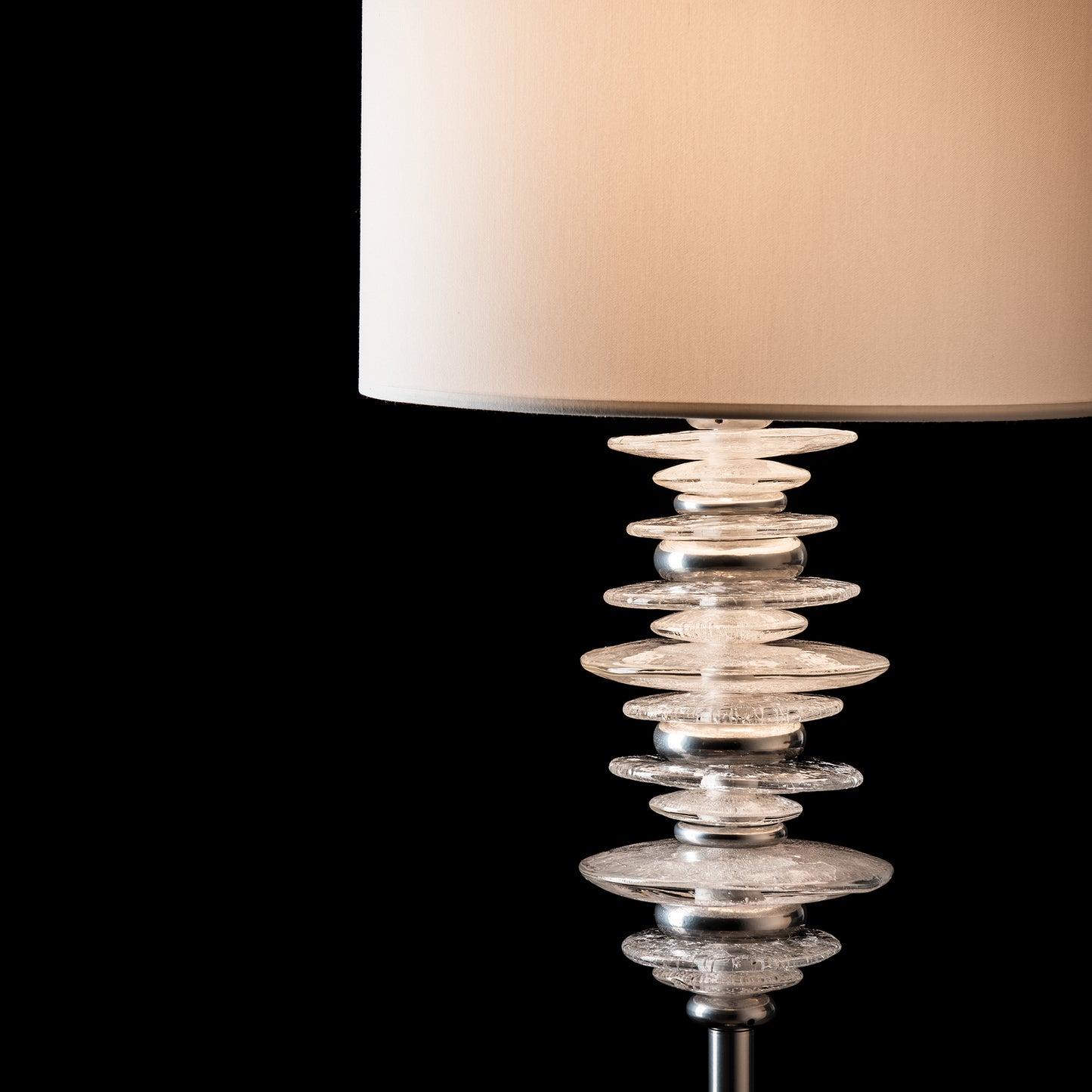 Hubbardton Forge Cairn Floor Lamp with a white shade and clear glass base, handcrafted in Vermont and showcasing superior American-made quality.