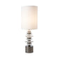 Cairn Table Lamp by Hubbardton Forge with elegant white cylindrical shade, metallic base, and stacked glass discs; American-made artisan furniture piece.