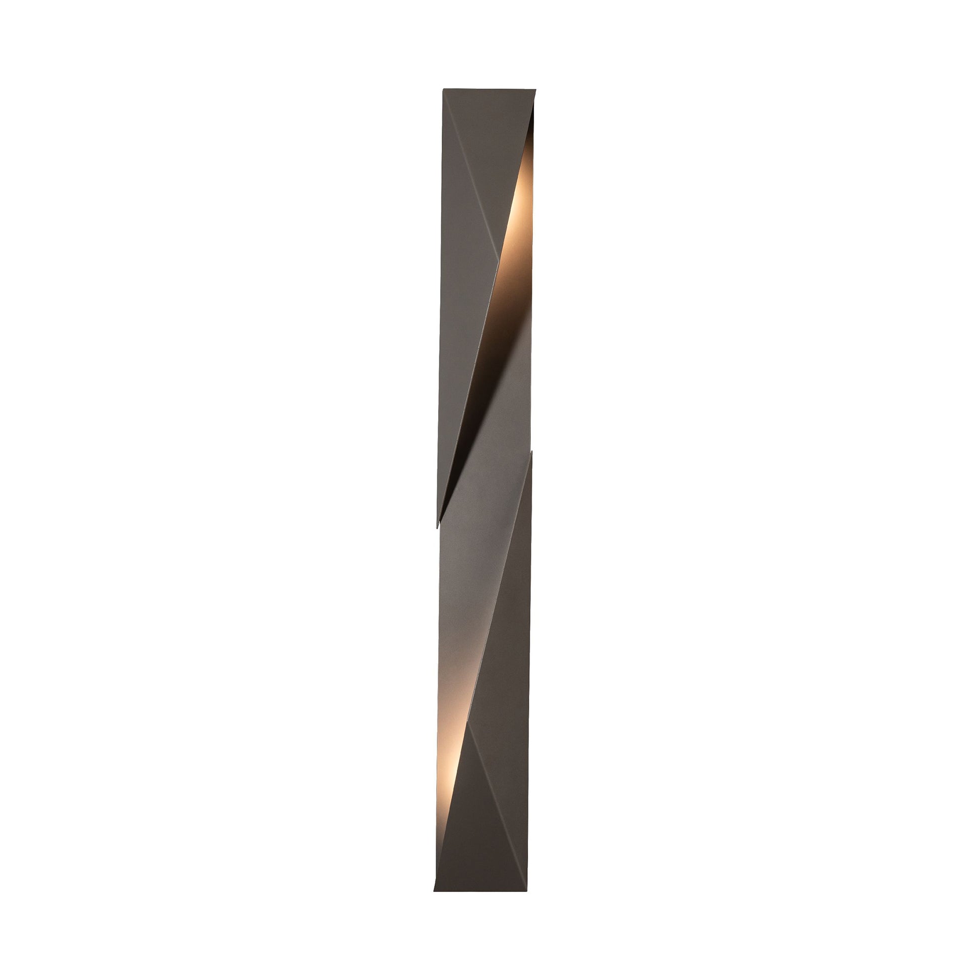 Carbon Large Outdoor Sconce by Hubbardton Forge with a tall, geometric structure and distinct angled light cutouts, showcasing modern craftsmanship in artisanal metalwork.