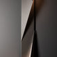 Close-up of the Hubbardton Forge Carbon Large Outdoor Sconce featuring two hand-forged steel panels with a sleek, modern design.