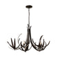 Hubbardton Forge Caribou 5-Light Chandelier, a handcrafted dark metal fixture with five lights on elegant, antler-inspired curved arms.