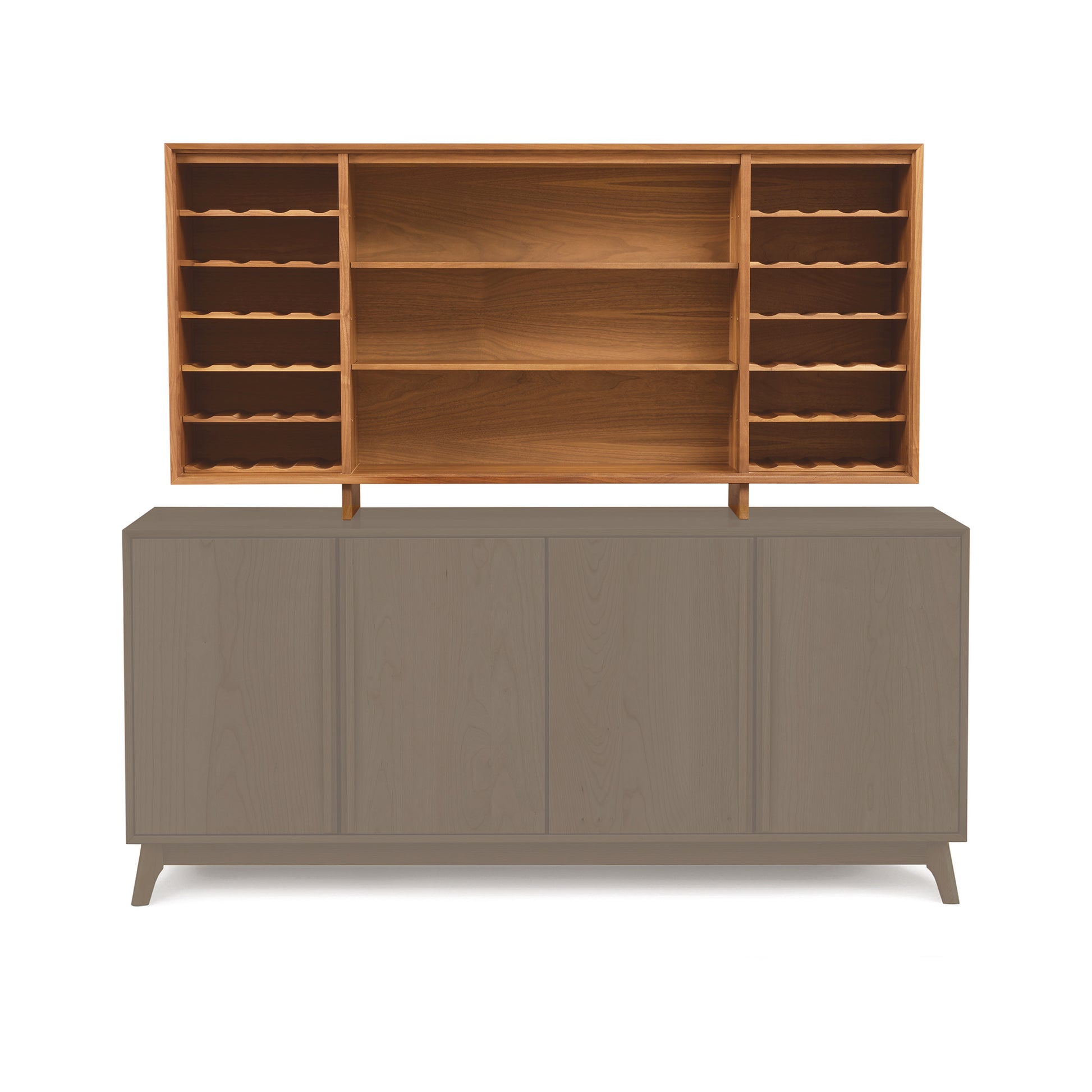 The Catalina 30" Buffet Hutch by Copeland Furniture features a mid-century modern design with four closed cabinets on the bottom and an open upper shelf unit. The upper section offers multiple small vertical shelves and a central open space. The bottom boasts a light gray color, while the top showcases a natural wood finish.