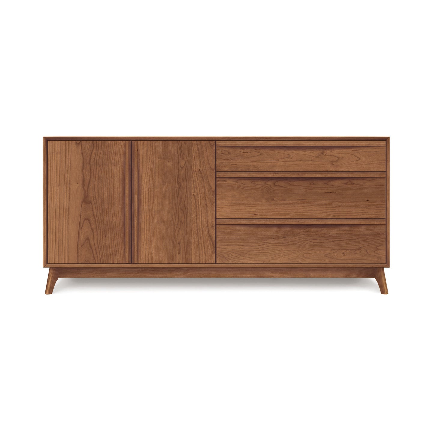 The Copeland Furniture Catalina 3-Drawer, 2-Door Dresser showcases a mid-century modern design with three drawers on the right and two doors on the left. This solid wood piece boasts a smooth finish, sitting on short, angled legs. Its natural light brown color with visible grain patterns makes it perfect for any stylish home.