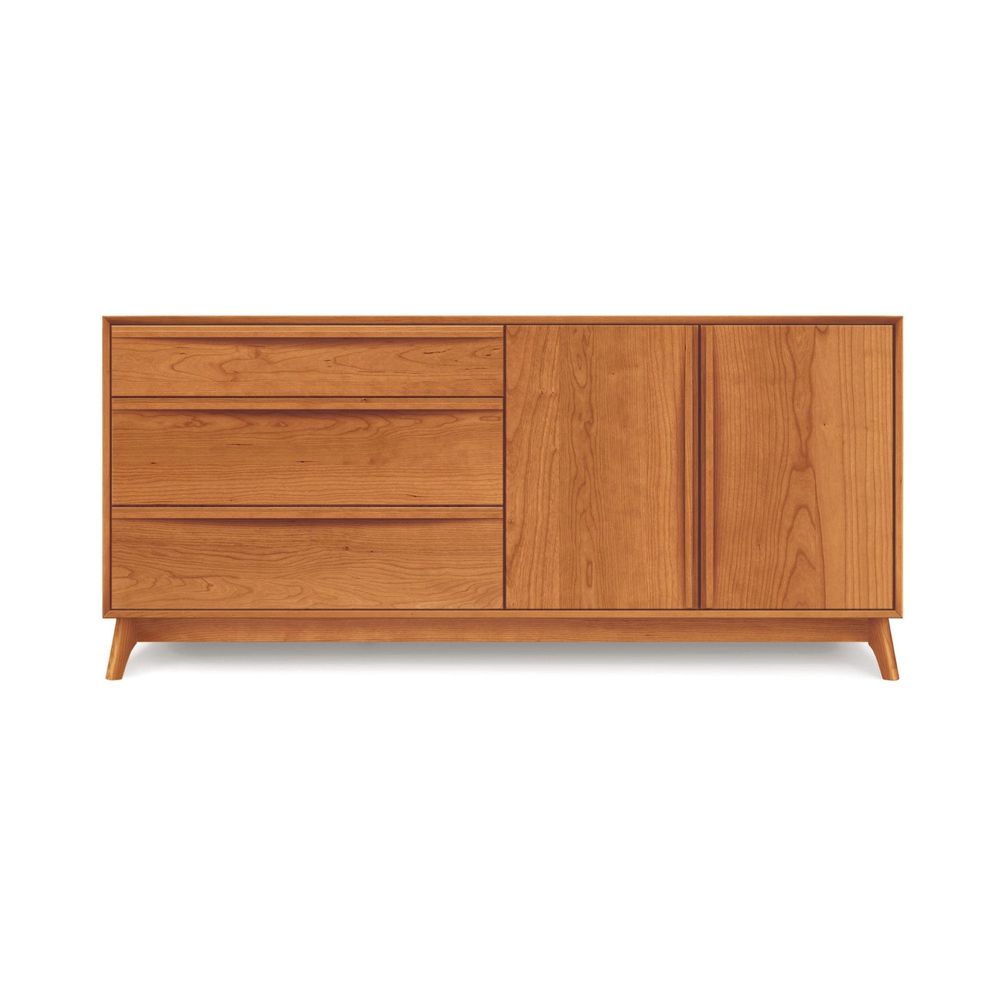 The Catalina 3-Drawer, 2-Door Dresser by Copeland Furniture features a minimalist, mid-century modern design with three drawers on the left and a double-door cabinet on the right. Crafted from light brown wood, this elegant piece sits on simple, tapered legs, making it ideal for bedroom storage.