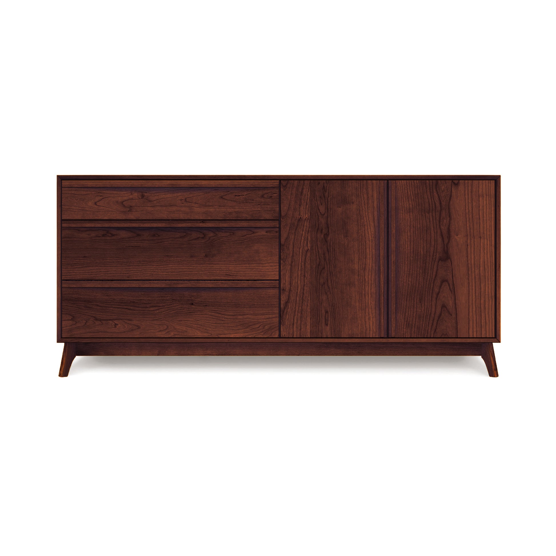 The Catalina 3-Drawer, 2-Door Dresser by Copeland Furniture is a wooden sideboard with a dark brown finish. It features three drawers on the left and a cabinet with double doors on the right. Reminiscent of mid-century modern design, this dresser stands on four tapered legs. Its sleek and minimalist design makes it an ideal piece for stylish bedroom storage.