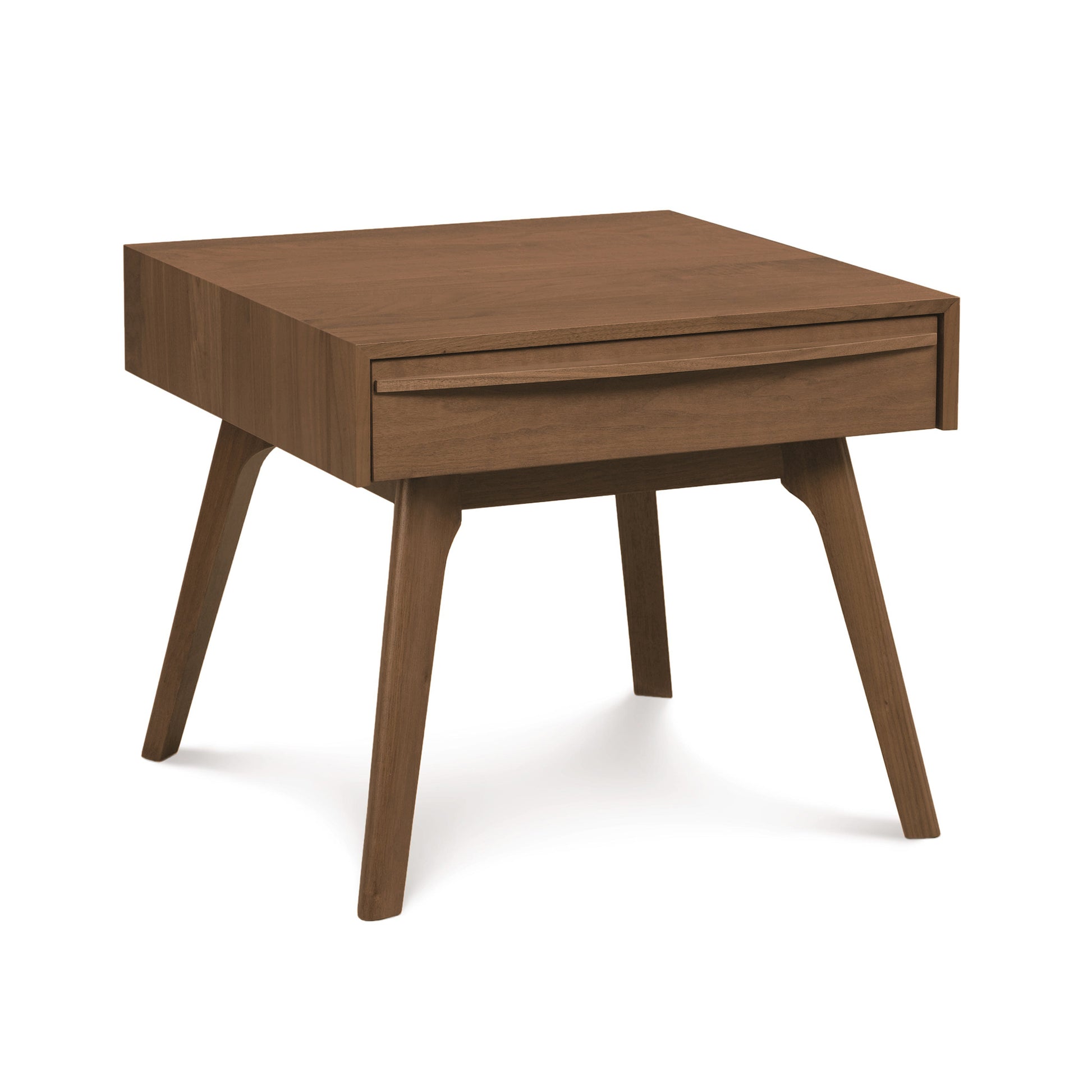 A wooden Copeland Furniture Catalina 1-Drawer Nightstand with an angular design and a single drawer, standing on four splayed legs.