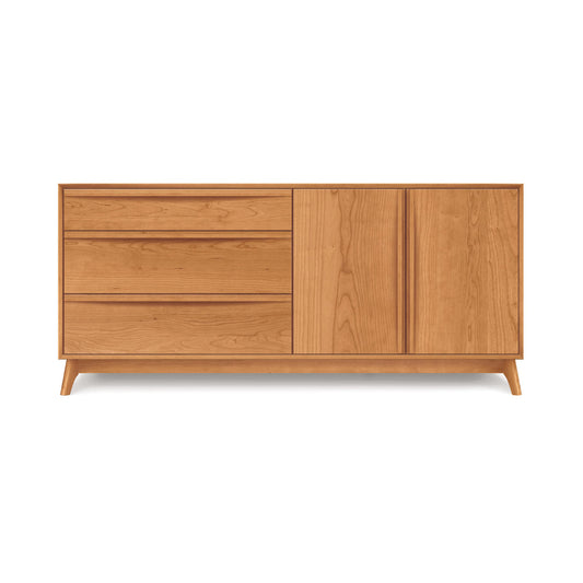 A luxury Catalina 3-Drawers, 2-Door Buffet by Copeland Furniture with three drawers on the left side and two doors on the right side, standing on angled legs, isolated against a white background.