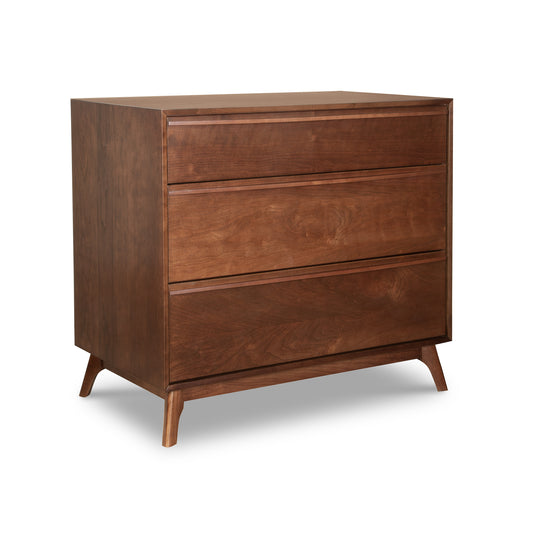 Copeland Catalina 3-Drawer Chest in Saddle Cherry with angled legs and modern lines, crafted in America from high-quality hardwood.