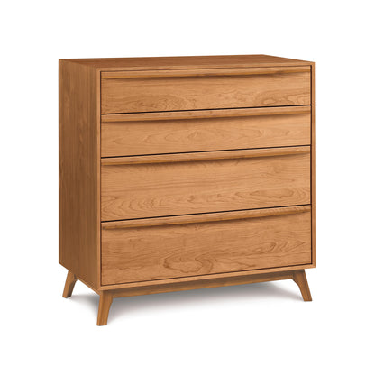 A Copeland Furniture Catalina 4-Drawer Chest, crafted from sustainable harvested woods, isolated on a white background.