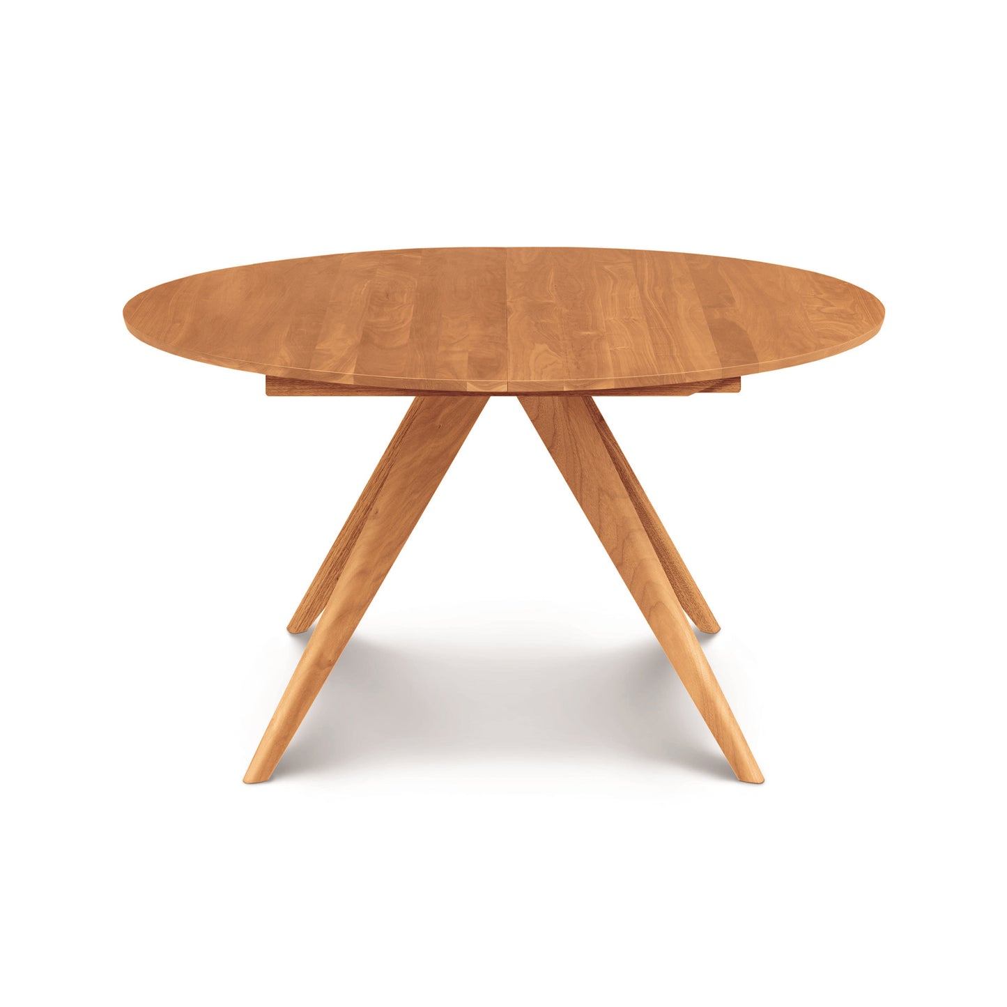 Round Catalina Round Extension Table, crafted from solid North American wood with a symmetrical cross base, isolated on a white background.