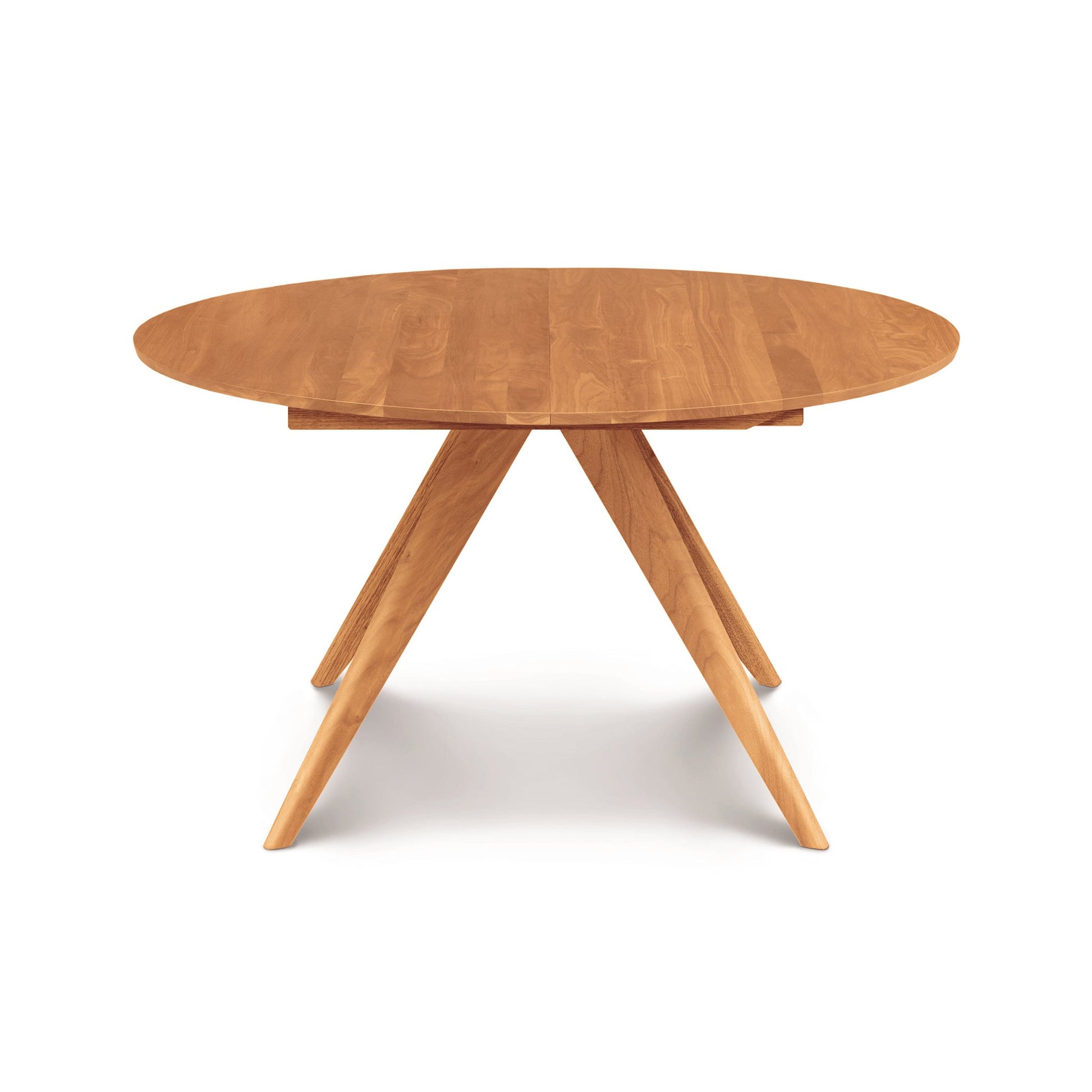 A round wooden table with three legs on a white background.