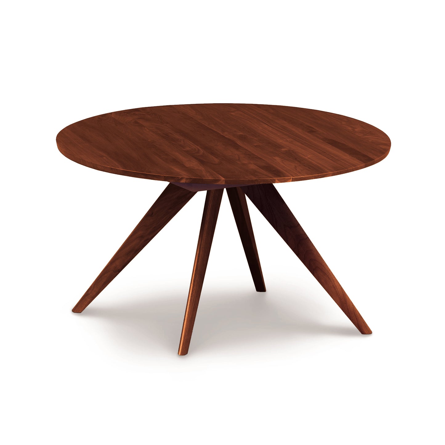 A round Copeland Furniture Catalina Round Extension Table with four angled legs on a white background, crafted from solid North American wood.