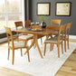 Copeland Furniture Catalina Trestle Extension Table with six mid-century chairs, showcasing American-made craftsmanship and elegant wood design.