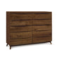 A Catalina 10-Drawer Dresser by Copeland Furniture with six drawers and angled legs for bedroom storage.