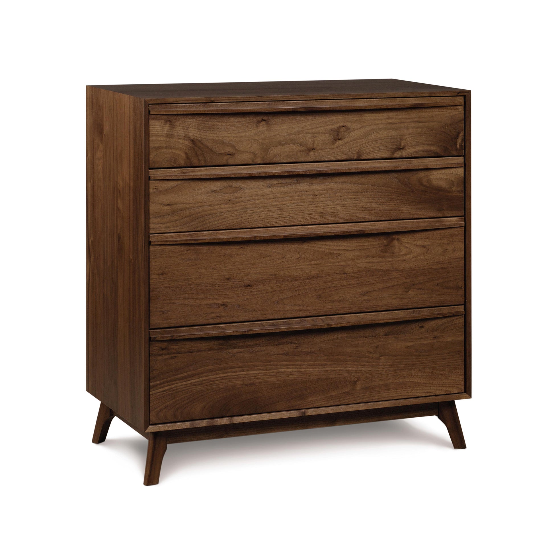 The Copeland Furniture Catalina 4-Drawer Chest is a modern chest of drawers with wooden legs. It is handmade in Vermont and perfect for a modern bedroom.