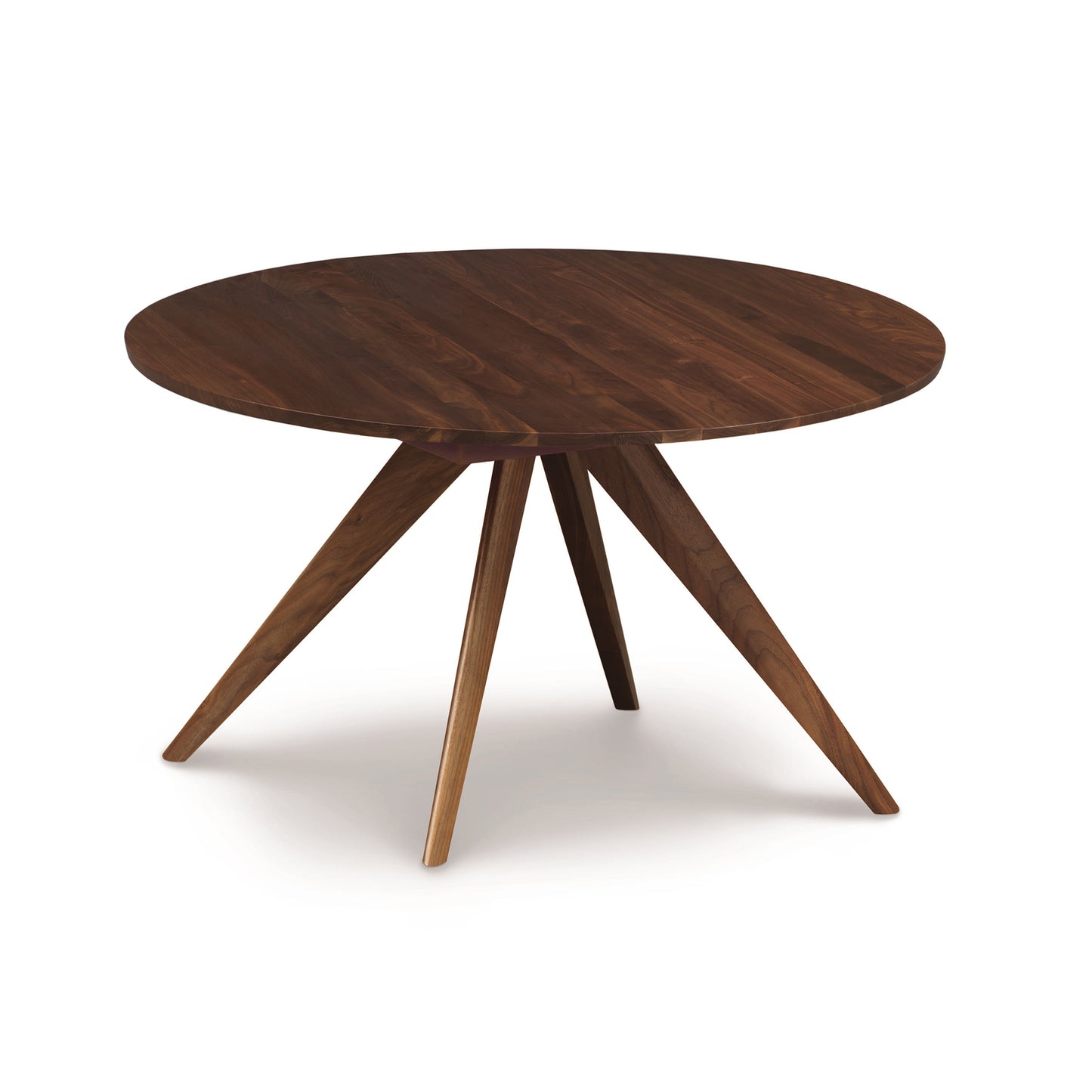 A Catalina round extension table with tapered legs on a white background, crafted from solid North American wood by Copeland Furniture.