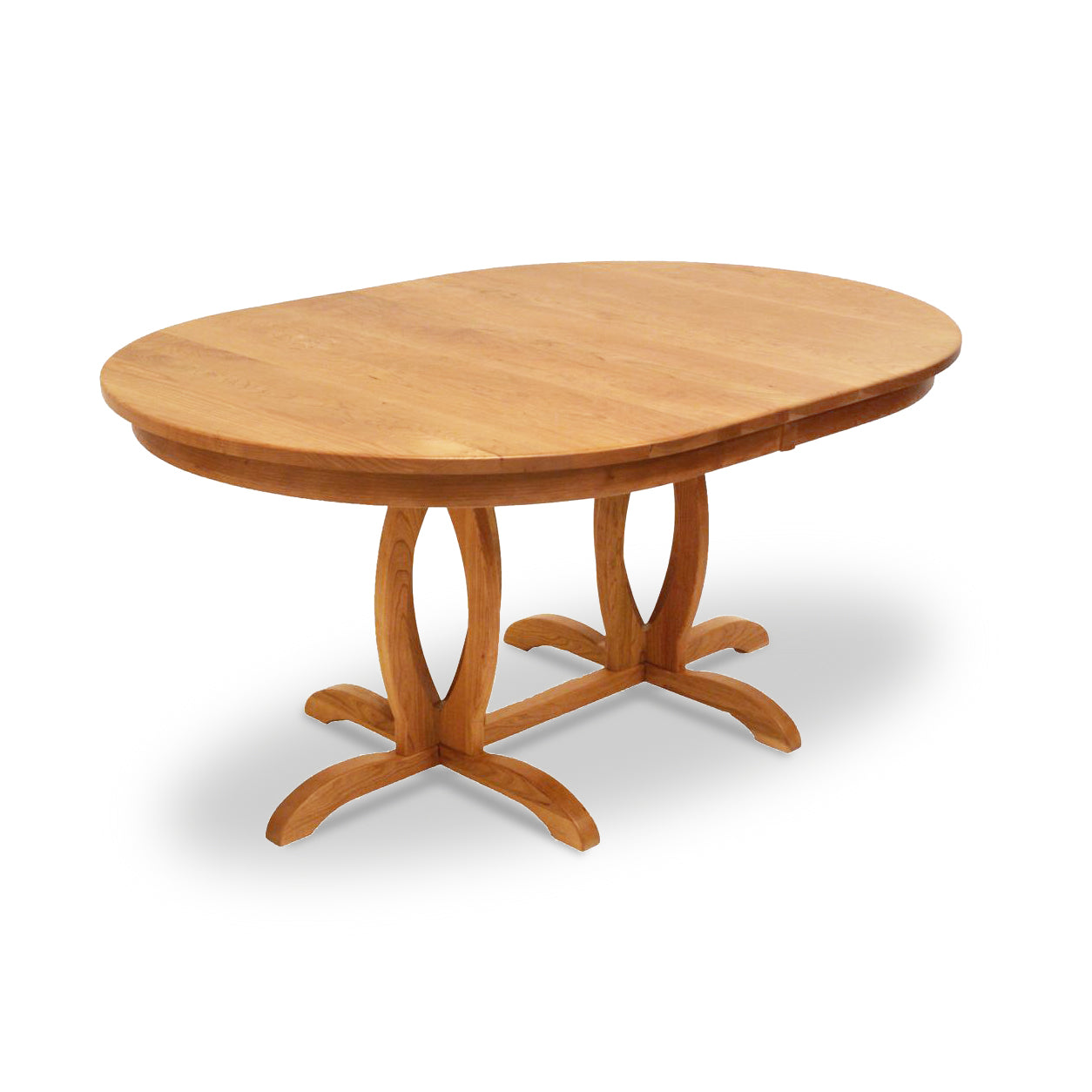 The Cherry Blossom Double Pedestal Extension Table by Lyndon Furniture is a wooden dining table with an oval top and a traditional double pedestal base featuring curved legs and cut-out details. Crafted from cherry wood in America, this table boasts a natural wood finish.