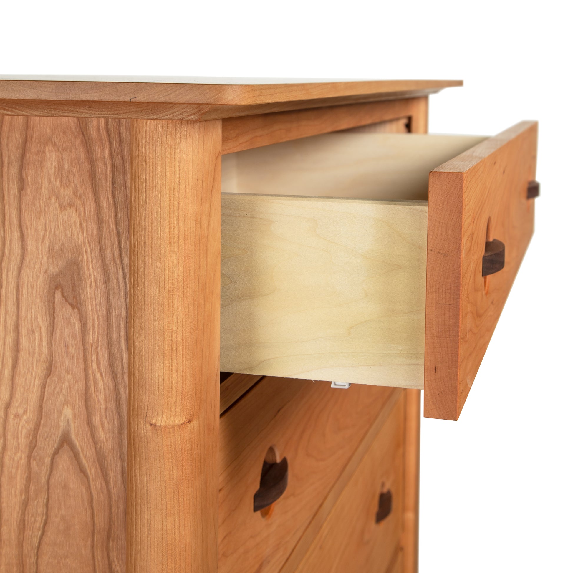 Cherry Moon 6-Drawer Chest by Maple Corner Woodworks features eco-friendly hardwoods and one open drawer, highlighting American craftsmanship.