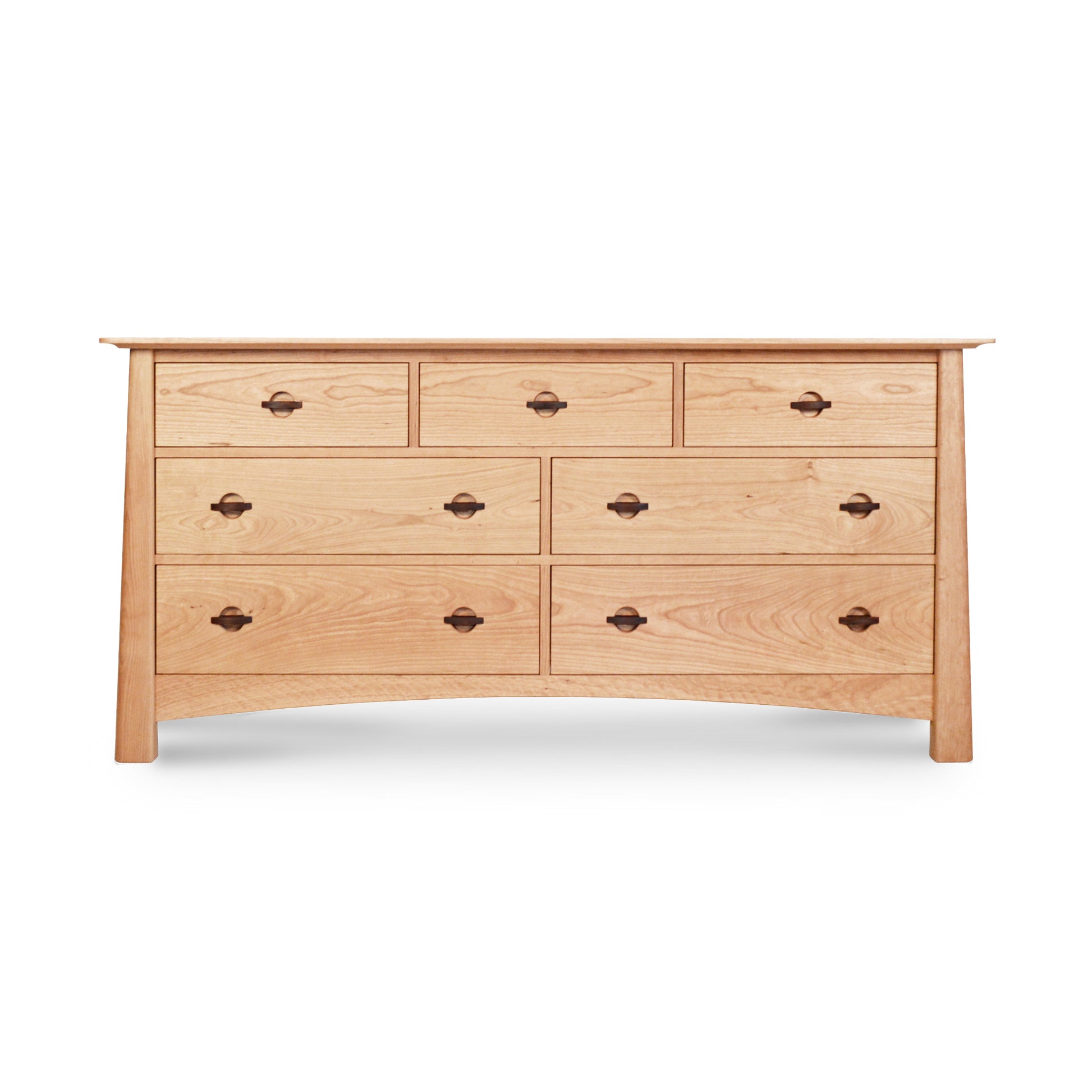 A Cherry Moon 7-Drawer Dresser by Maple Corner Woodworks with round handles, isolated on a white background.