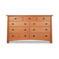 Cherry Moon 9-Drawer Dresser by Maple Corner Woodworks, eco-friendly design with three small top drawers and six spacious lower drawers, featuring sleek metal handles.