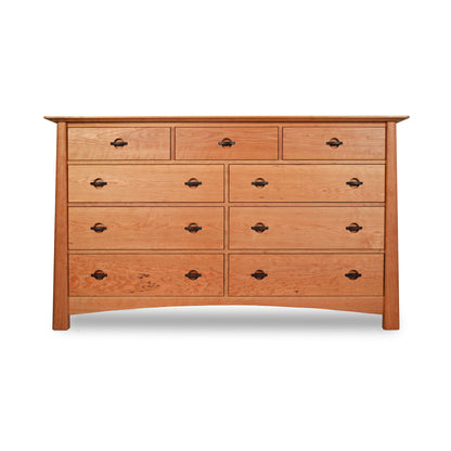 An image of the Maple Corner Woodworks Cherry Moon 9-Drawer Dresser, an eco-friendly wooden dresser made from sustainably harvested solid woods.