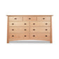 A Cherry Moon 9-Drawer Dresser by Maple Corner Woodworks.