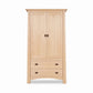 Cherry Moon Armoire by Maple Corner Woodworks crafted from solid hardwood in Vermont with dark metal handles, showcasing fine American craftsmanship.