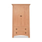 A high-end, handcrafted Maple Corner Woodworks Cherry Moon armoire with two drawers and two doors.
