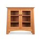 Cherry Moon Bookcase with Glass Doors by Maple Corner Woodworks, handmade in Vermont, features two interior shelves and fine cherry wood craftsmanship.