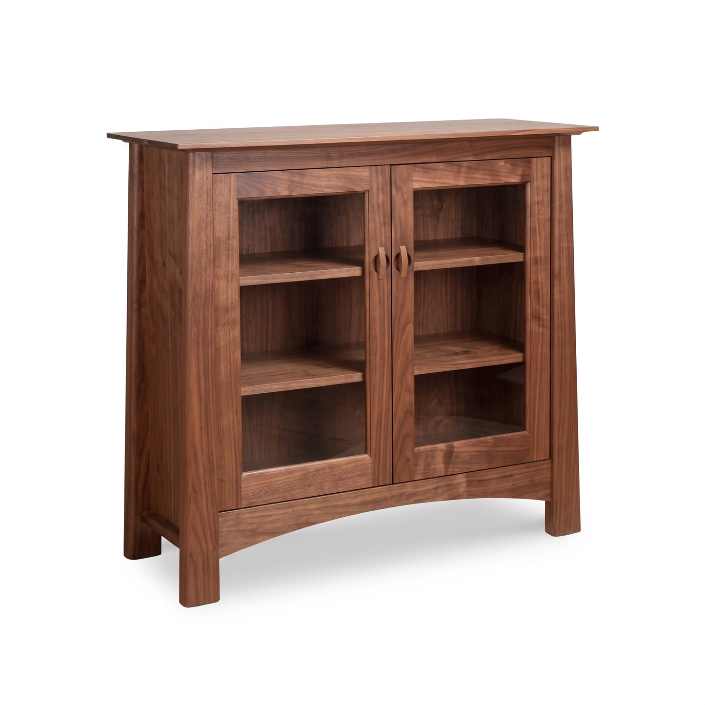 Cherry Moon Bookcase by Maple Corner Woodworks, handcrafted in Vermont from sustainable walnut with glass doors, elegant and durable statement piece.