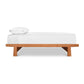 Alt: Cherry Moon Dovetail Platform Bed by Maple Corner Woodworks - minimalist solid cherry wood bed frame with eco-friendly oil finish, sustainably harvested hardwood, white linens – Vermont made American furniture.