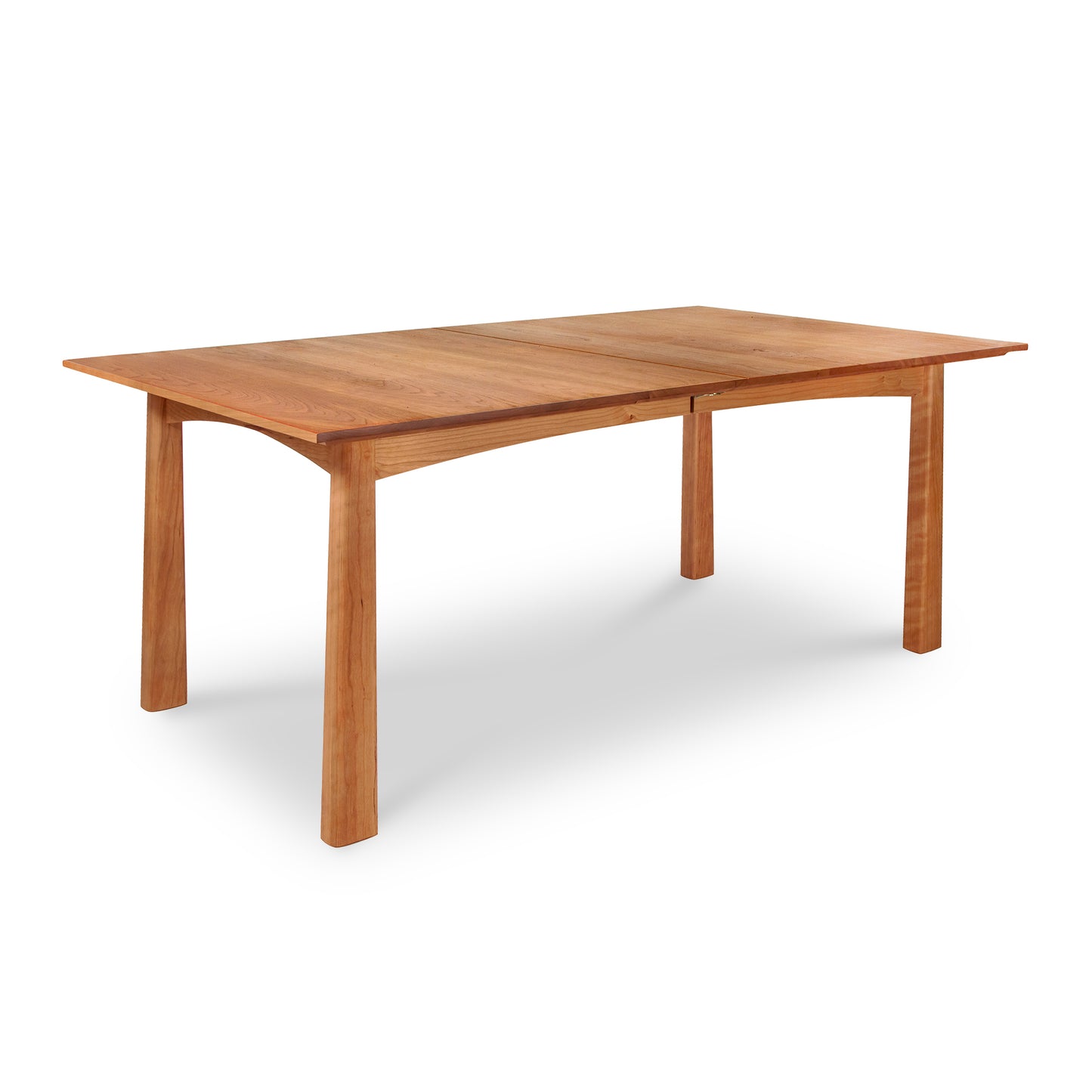 A Maple Corner Woodworks Cherry Moon Extension Dining Table with a smooth rectangular surface and four sturdy legs, capable of extension, set against a plain white background.