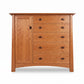 Maple Corner Woodworks Cherry Moon Gent’s Chest with five drawers and cabinet door, crafted in cherry wood with dark handles.