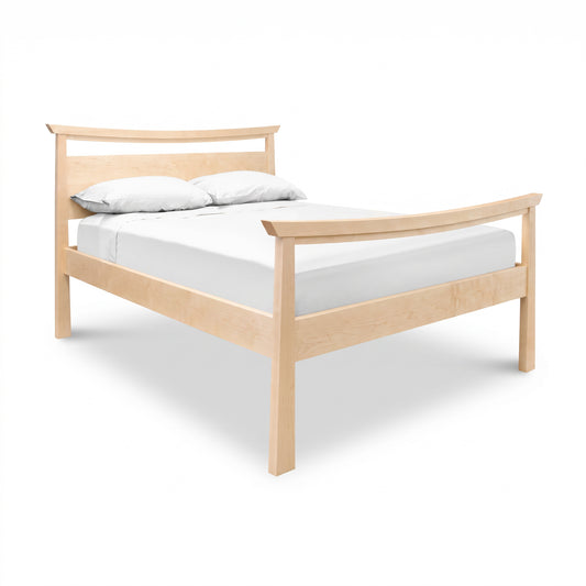 Cherry Moon Pagoda Bed by Maple Corner Woodworks with a light cherry finish, simple lines, white bedding, and two white pillows.