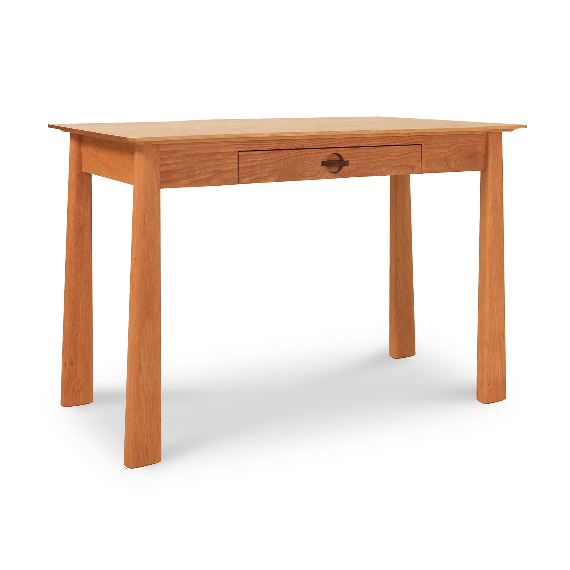 An eco-friendly Cherry Moon Writing Desk with a drawer and two legs by Maple Corner Woodworks.