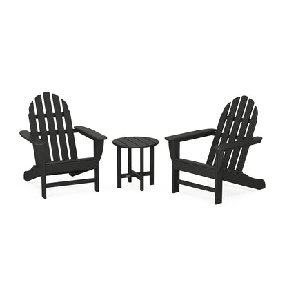 Two black POLYWOOD Classic Adirondack chairs with an accompanying small round table are positioned on a plain white background. The furniture is styled in a classic outdoor design, featuring weather-resistant materials ideal