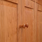 A close up of a Classic Country Buffet cabinet door, showcasing Lyndon Furniture craftsmanship and hardwood construction.