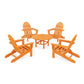 Five orange POLYWOOD Classic Folding Adirondack chairs arranged around a small matching circular table, set on a plain white background.